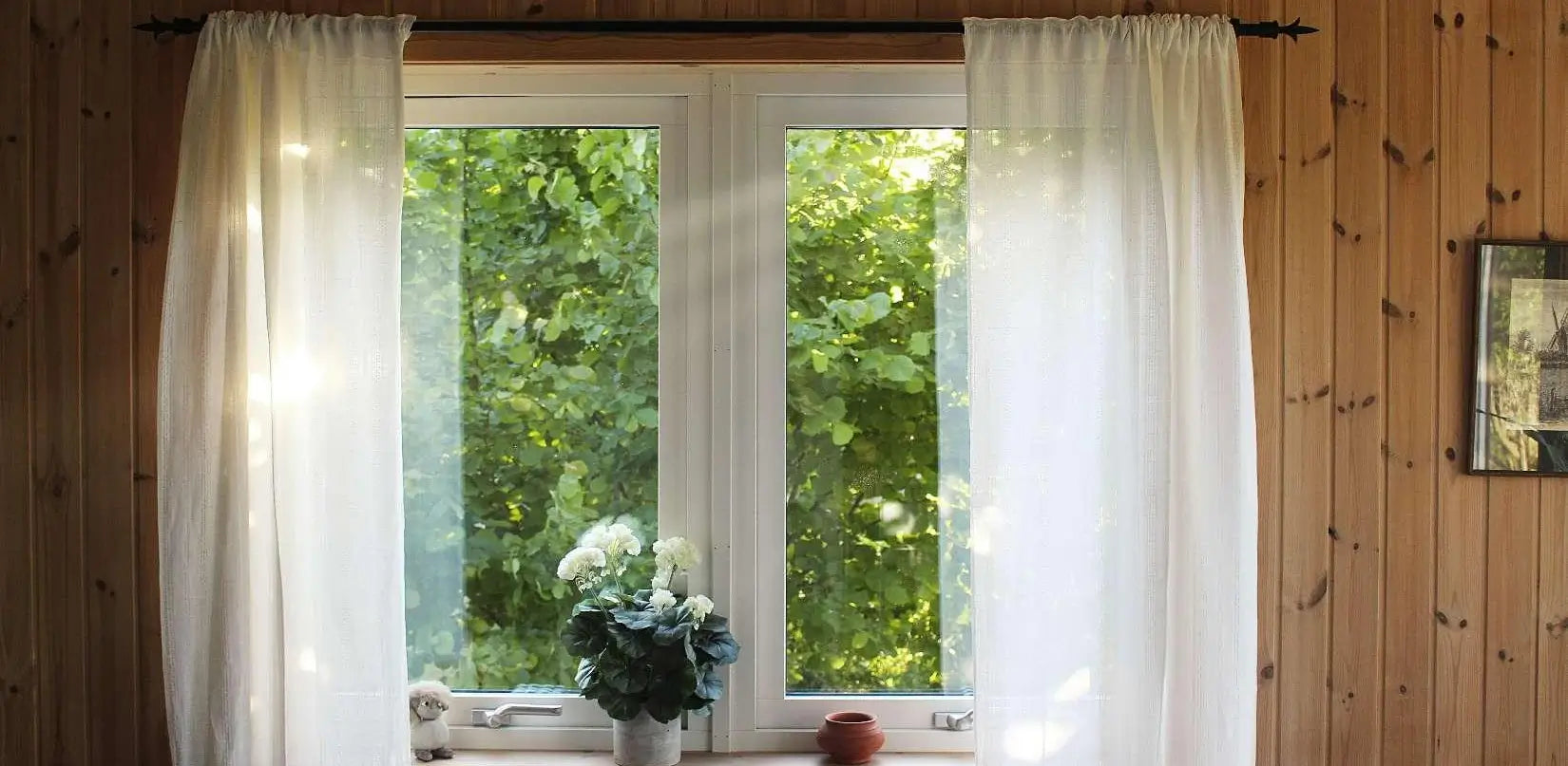 white-cotton-curtains-hanging-in-a-rustic-style-interior