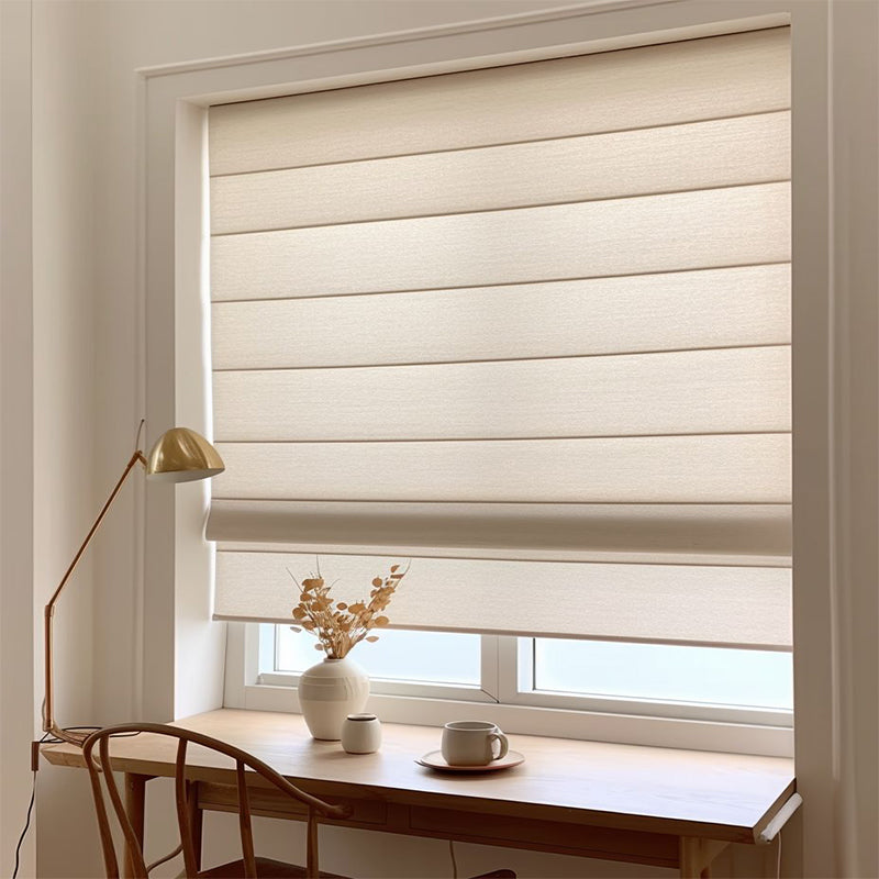 roman-blinds-hanging-in-front-of-the-window-by-the-desk